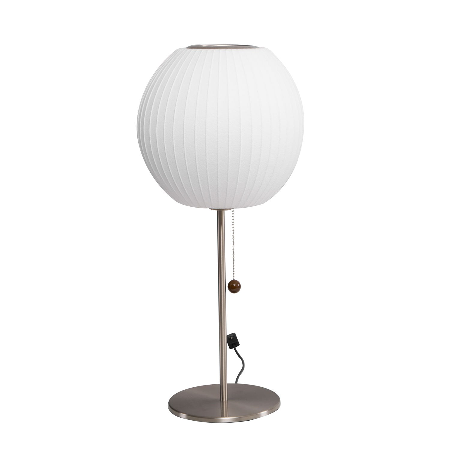 Chrome-stemmed faux silk bubble table lamp glowing in a cosy living room