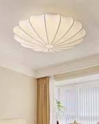 Nelson Bubble ceiling lamp over a dining setting giving off a warm refined light