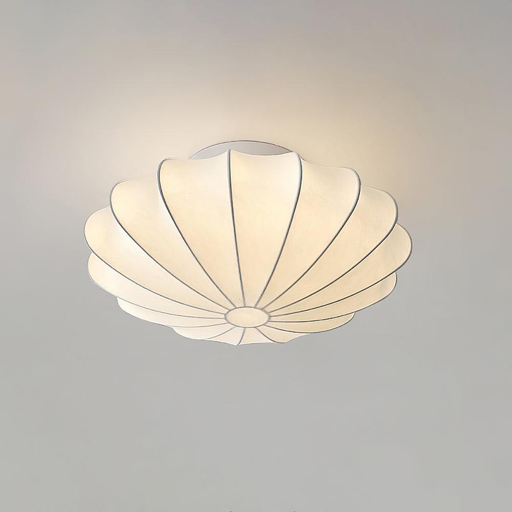 Nelson Bubble ceiling lamp hung in a cluster at staggered heights in an interior