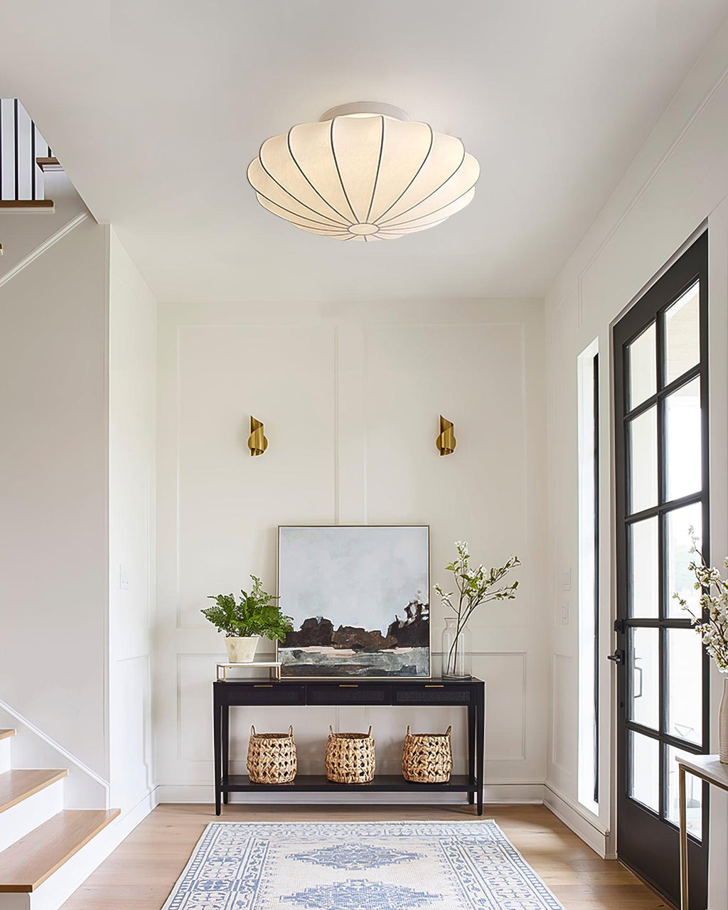 Nelson Bubble ceiling lamp shown lit, the silk diffusing warm ambient light
