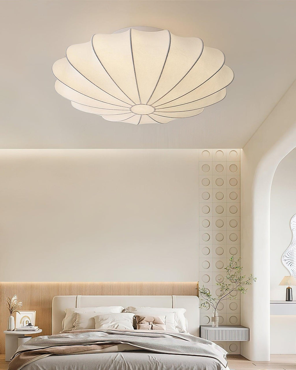 Nelson Bubble ceiling lamp shown lit, the silk diffusing warm ambient light