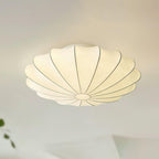 Nelson Bubble ceiling lamp over a dining setting giving off a warm refined light