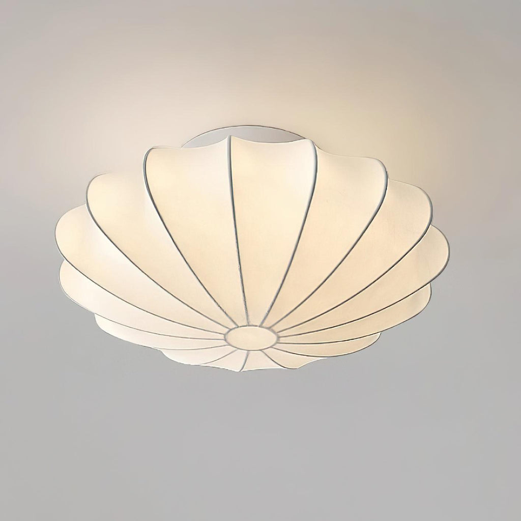 Nelson Bubble ceiling lamp with a silk cover over a steel wireframe casting a soft glow