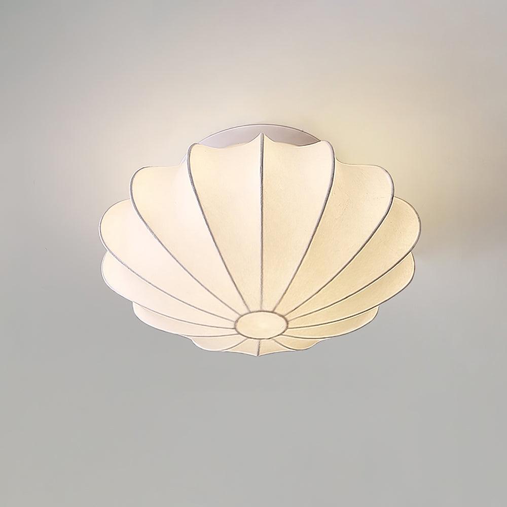 Nelson Bubble ceiling lamp with a silk cover over a steel wireframe casting a soft glow