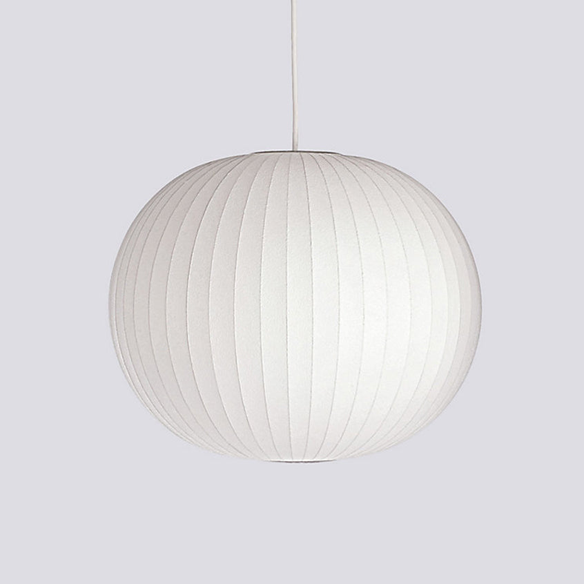 Rounded silk bubble pendant light casting soft warm light