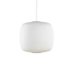 White silk bubble pendant light suspended above a dining area