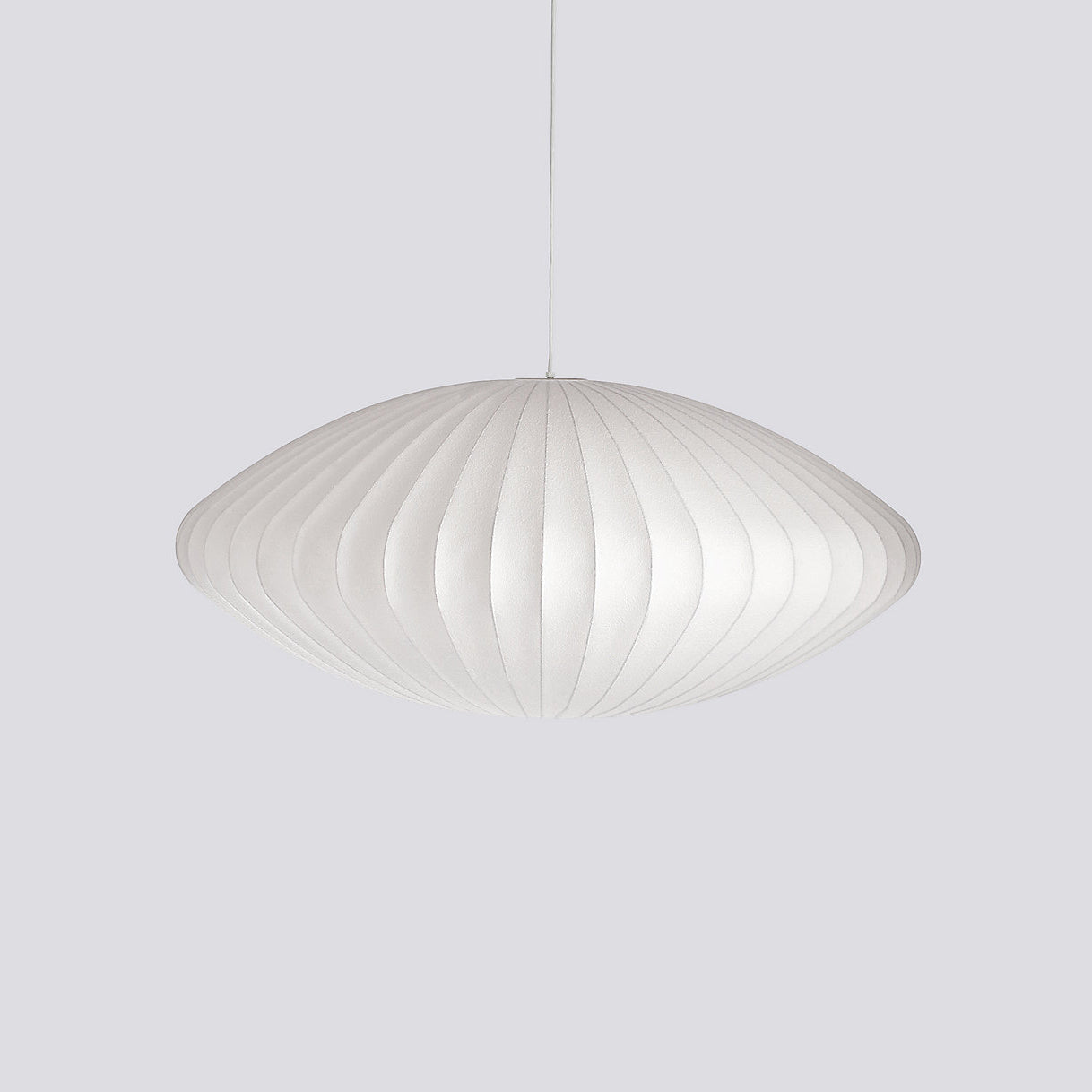 Silk bubble pendant light with soft criss-cross texture when lit