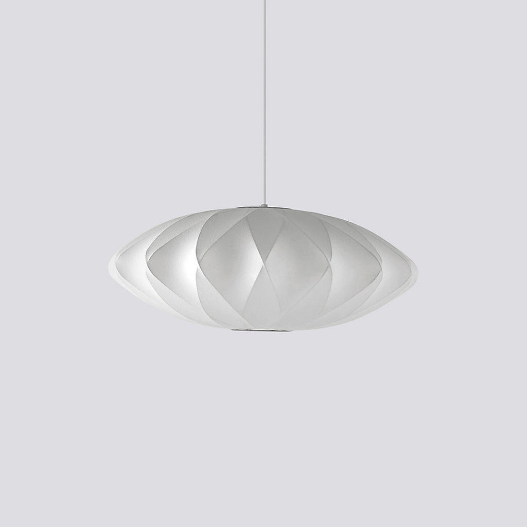 White silk bubble pendant light casting a gentle amber glow