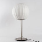 Faux silk bubble table lamp showing the pull-chain switch with wood accent