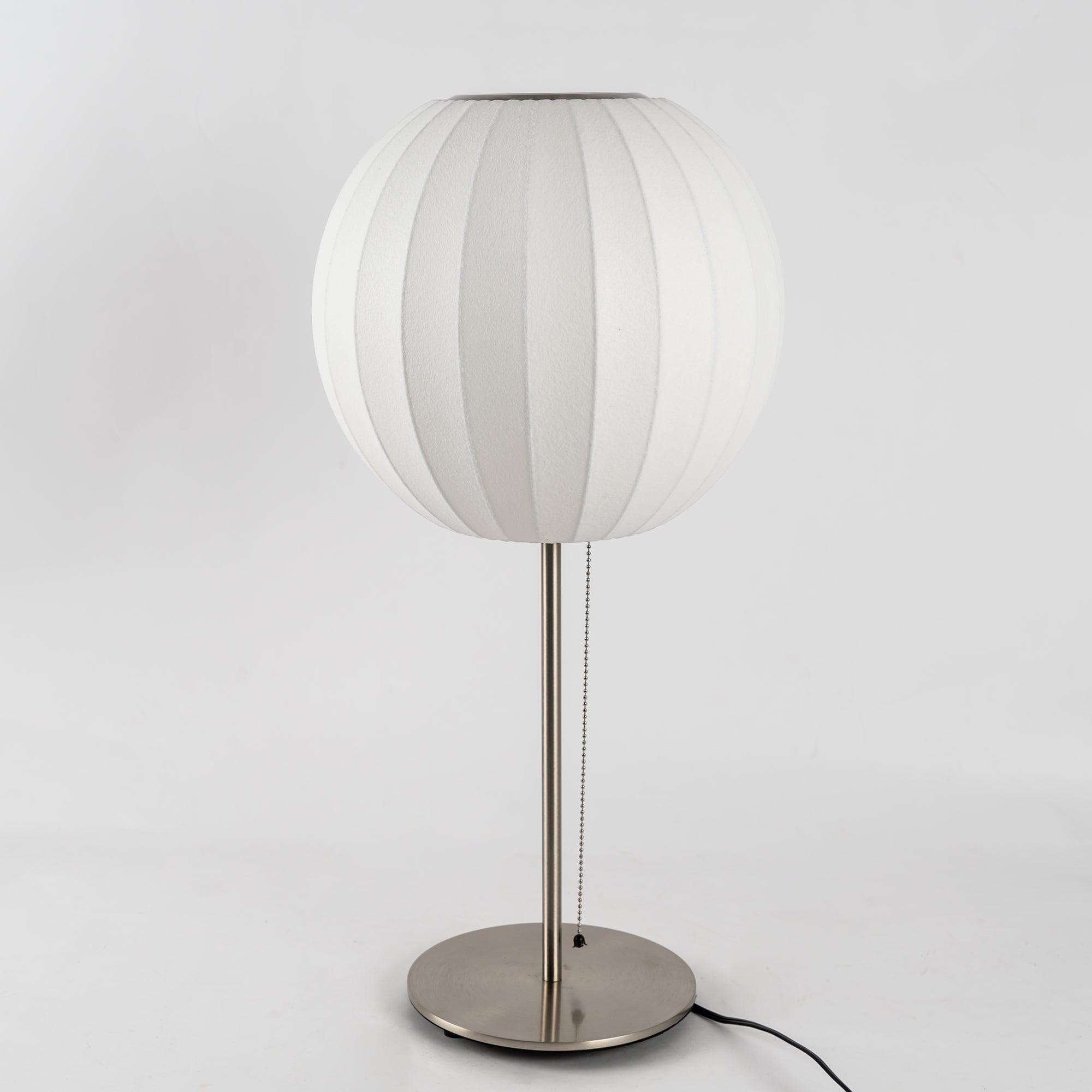 Faux silk bubble table lamp styled beside a sofa for warm ambient light