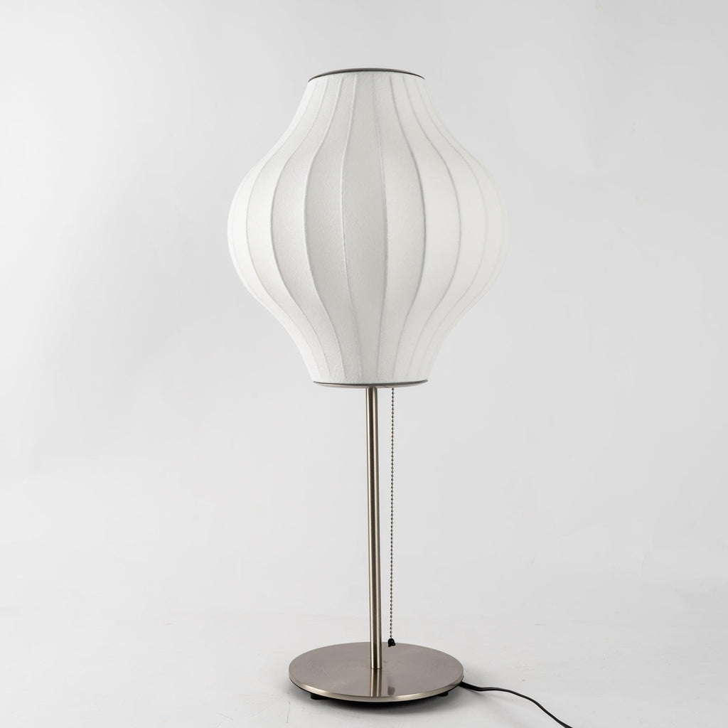 Close detail of the faux silk bubble shade's soft texture and curved form