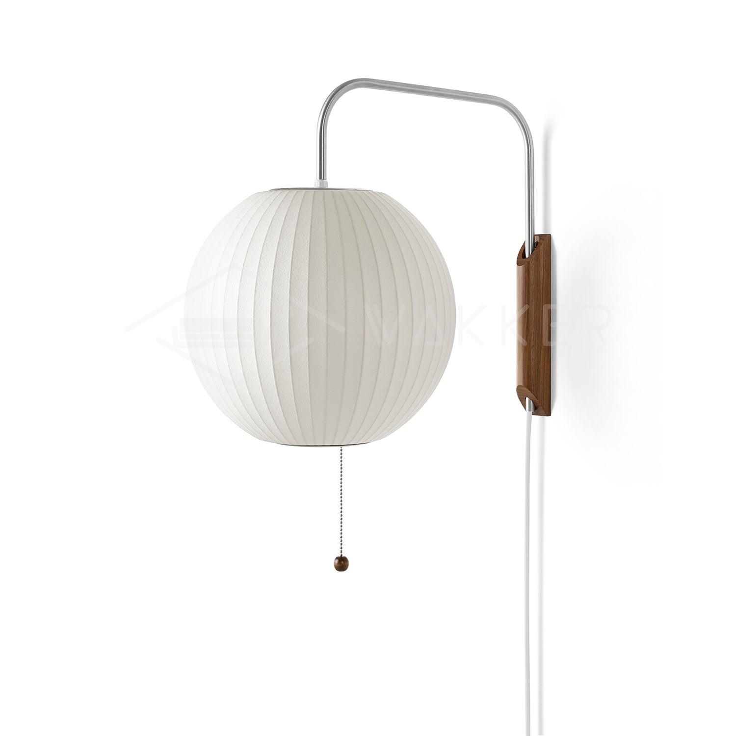 Mid-century white sphere wall sconce with chrome swivel bracket detail