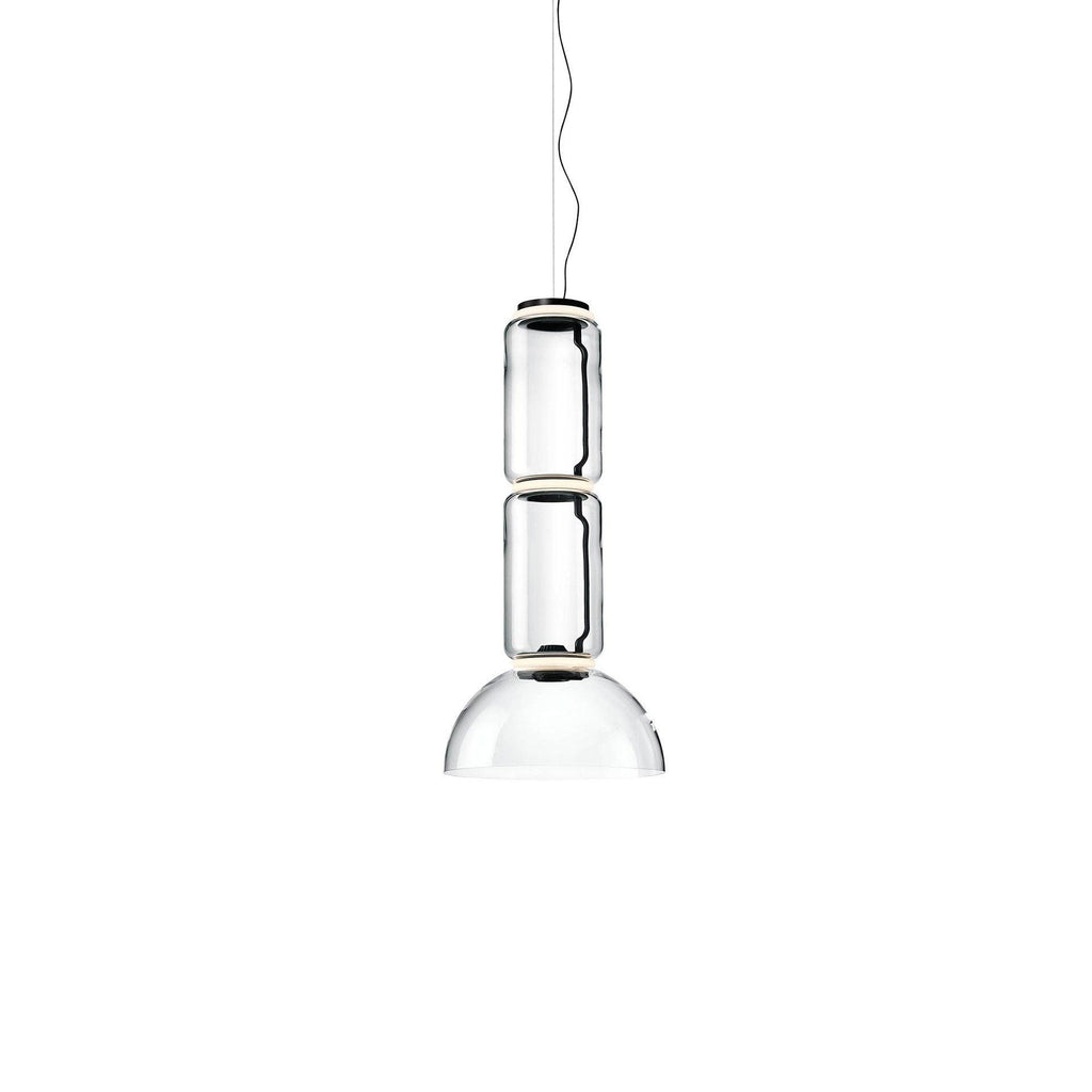 Studio shot of this Clérachic pendant with two glass cylinders above a dome-shaped shade.
