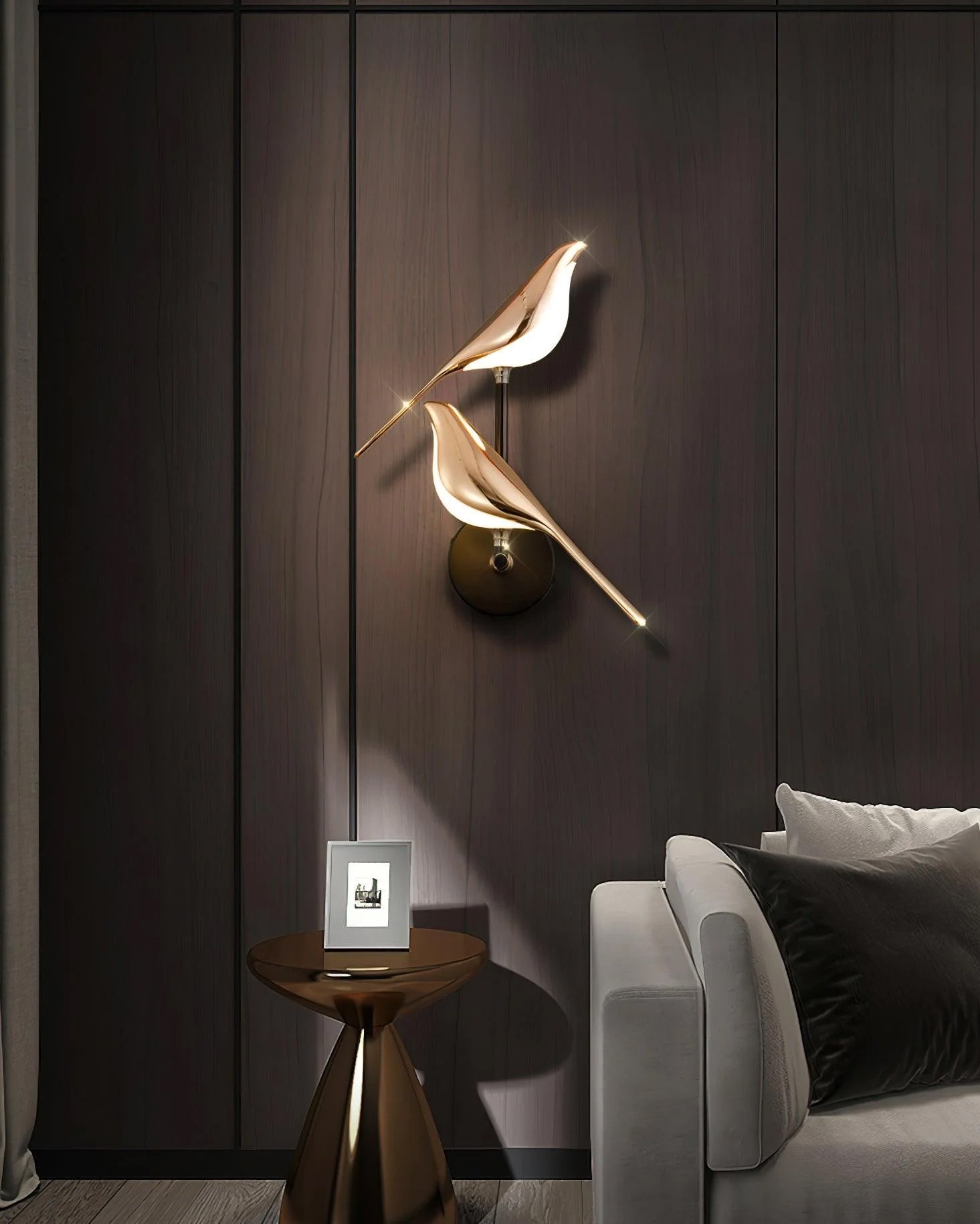 Nomi wall lamp shown switched off highlighting its bird silhouette