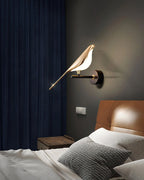 Nomi double-head wall lamp lit in a contemporary interior