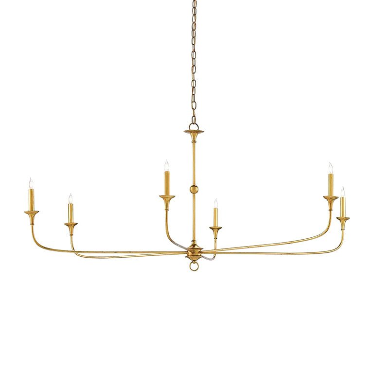 Candle chandelier shown lit above a living area