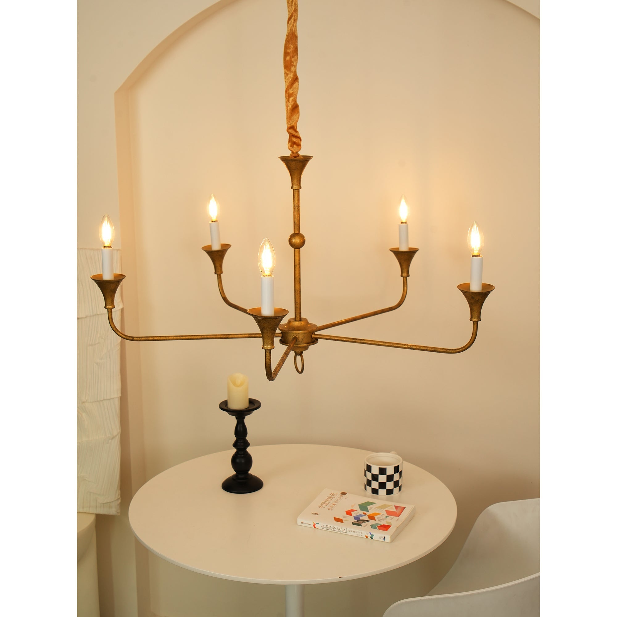 Candle chandelier styled in an elegant living space