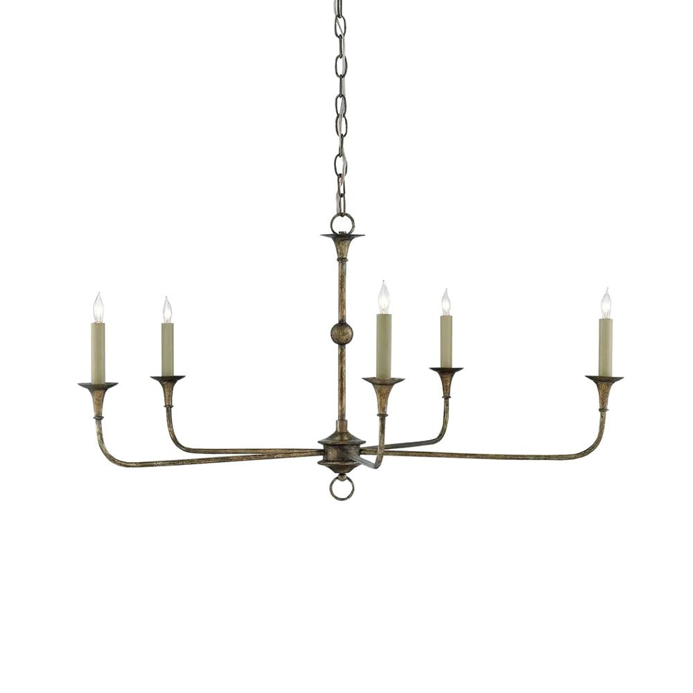 Candle chandelier illuminated in an evening interior