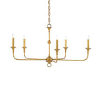 Candle chandelier shown in a warm room with bulbs glowing