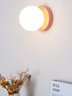 Nuvol wall lamp white glass globe shown close up
