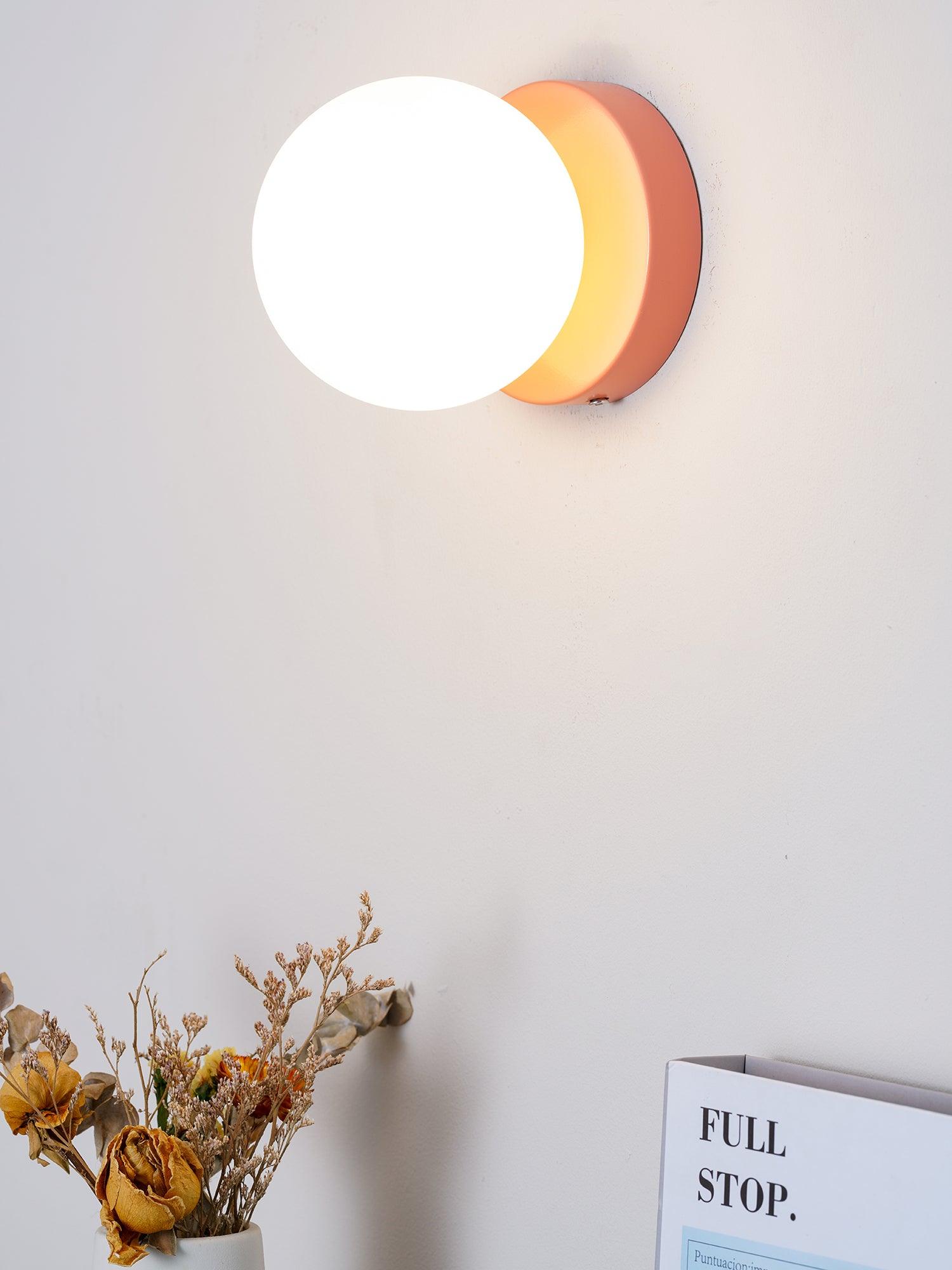 Nuvol wall lamp white glass globe shown close up