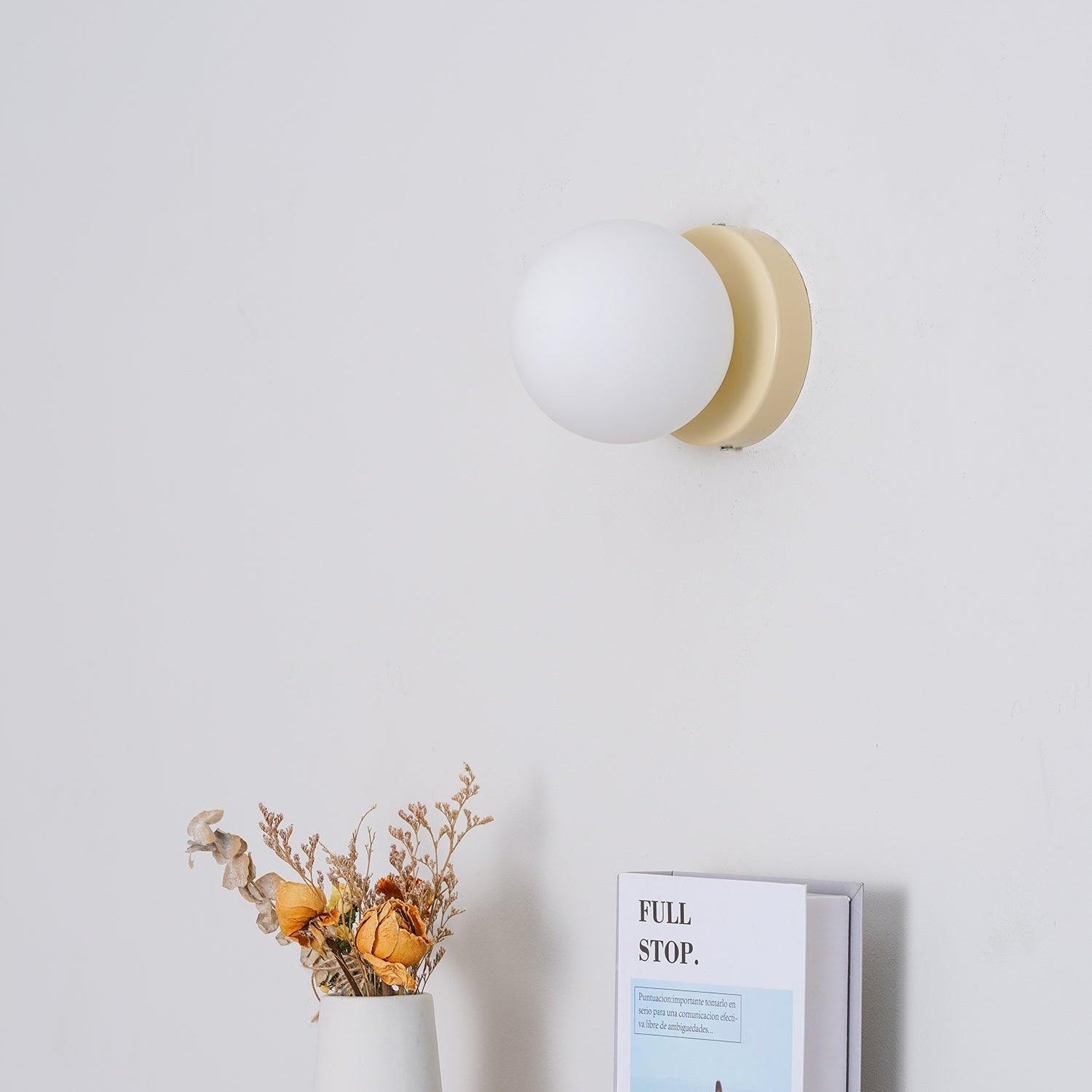 Nuvol wall lamp styled as a charming accent in a living room