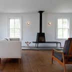 Beige Nuvol wall lamp adding subtle warmth to a neutral room