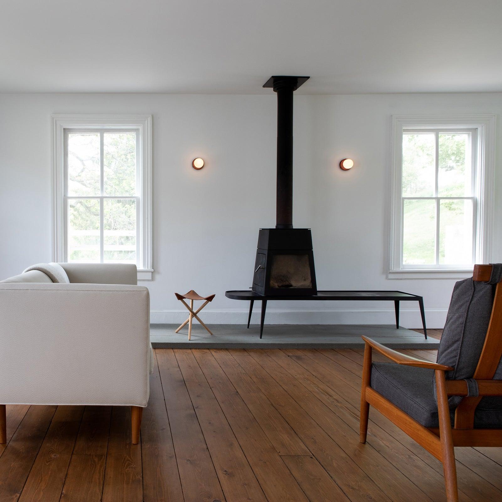 Beige Nuvol wall lamp adding subtle warmth to a neutral room