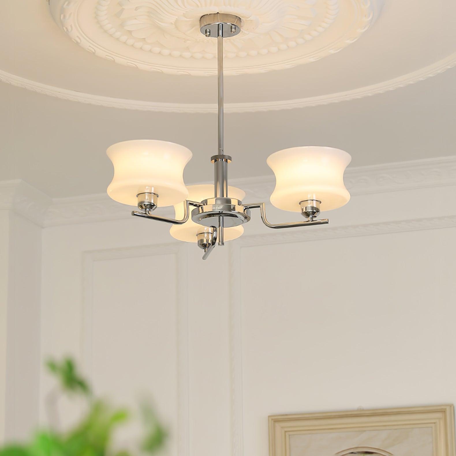 Vintage globe chandelier with chrome body and white glass shades