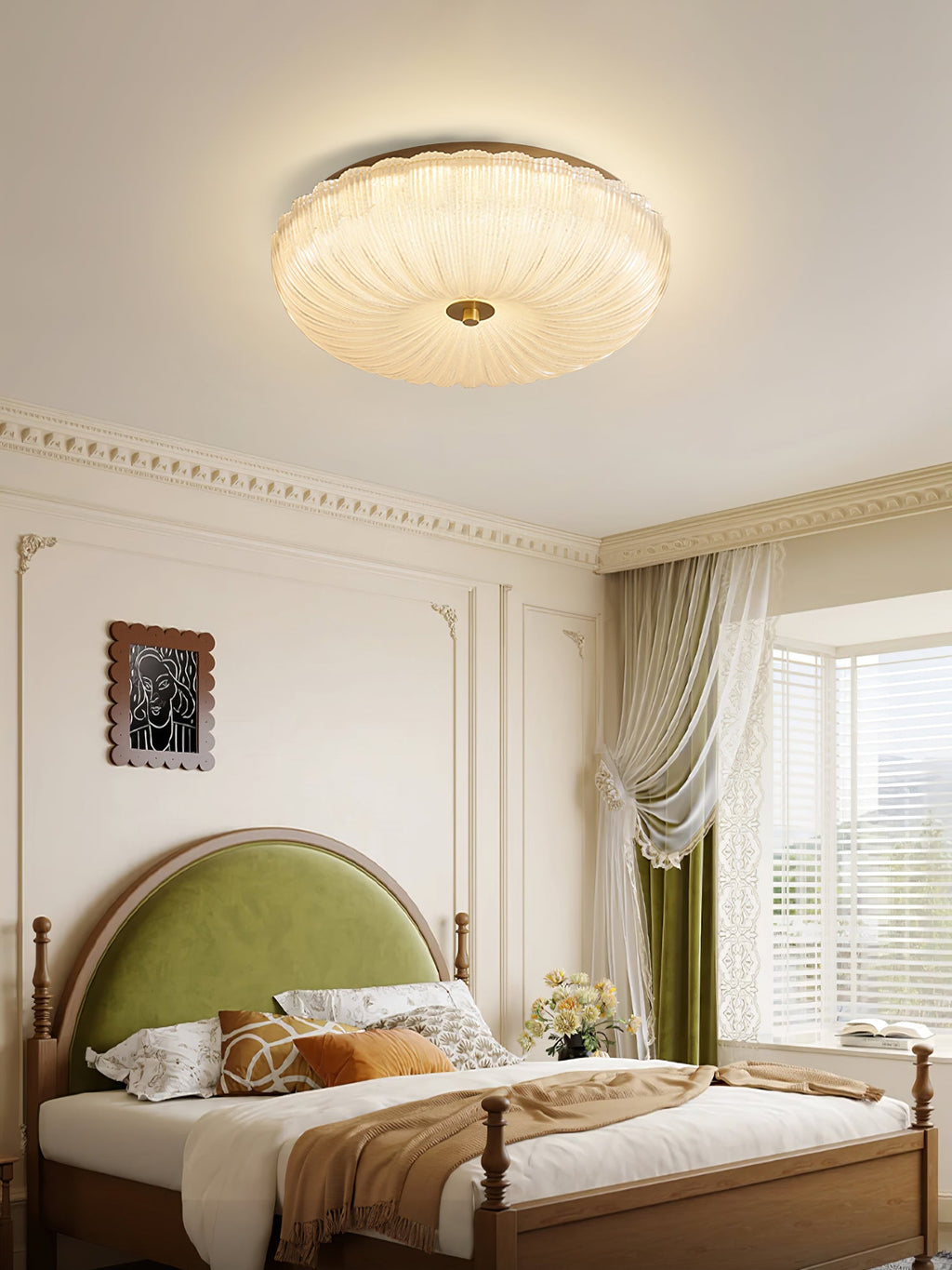 Flush frosted glass ceiling light glowing in a bedroom