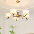 Globe chandelier lighting a cosy bedroom in nostalgic style