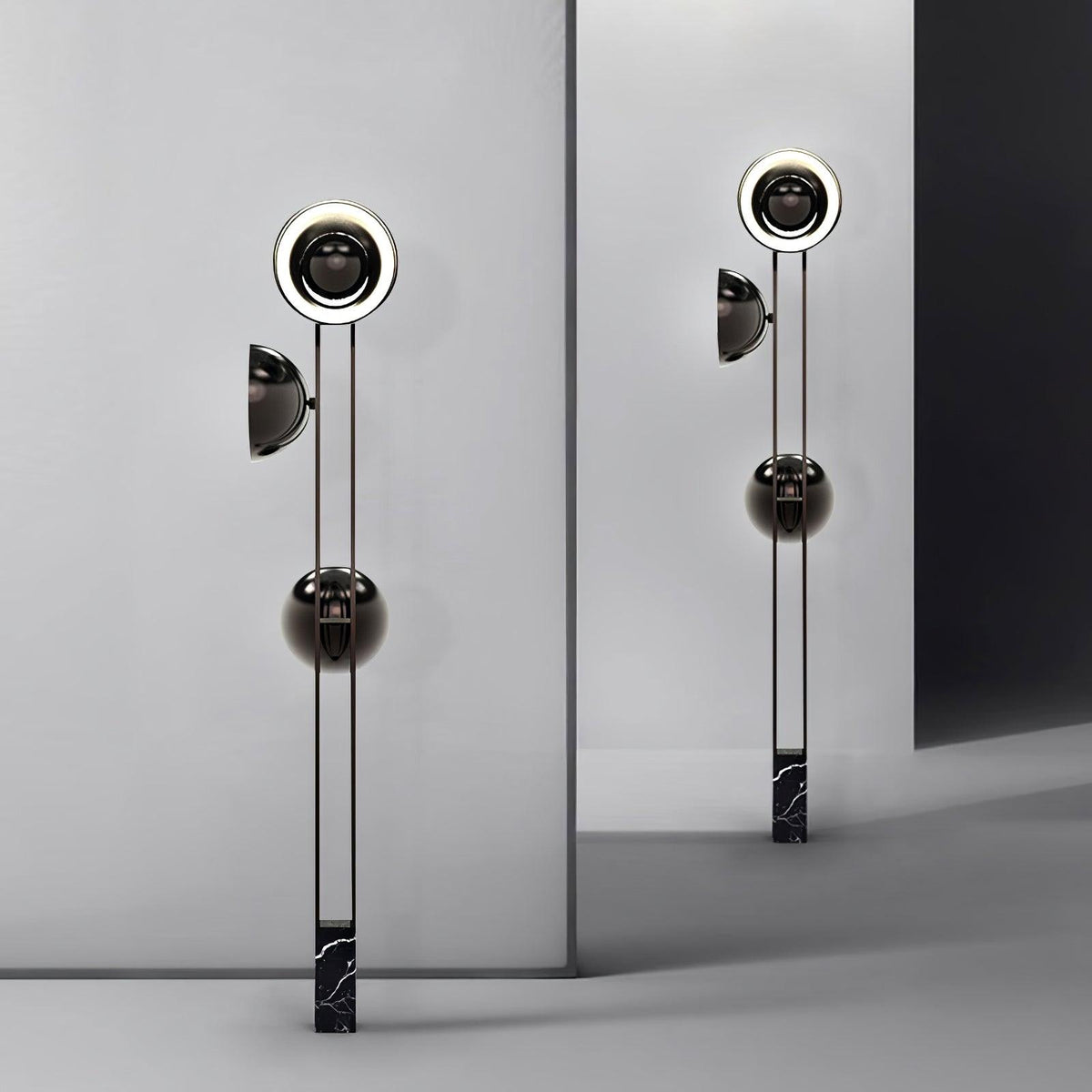Two Clérachic floor lamps shown side by side on a plain studio background, highlighting their matching marble bases.