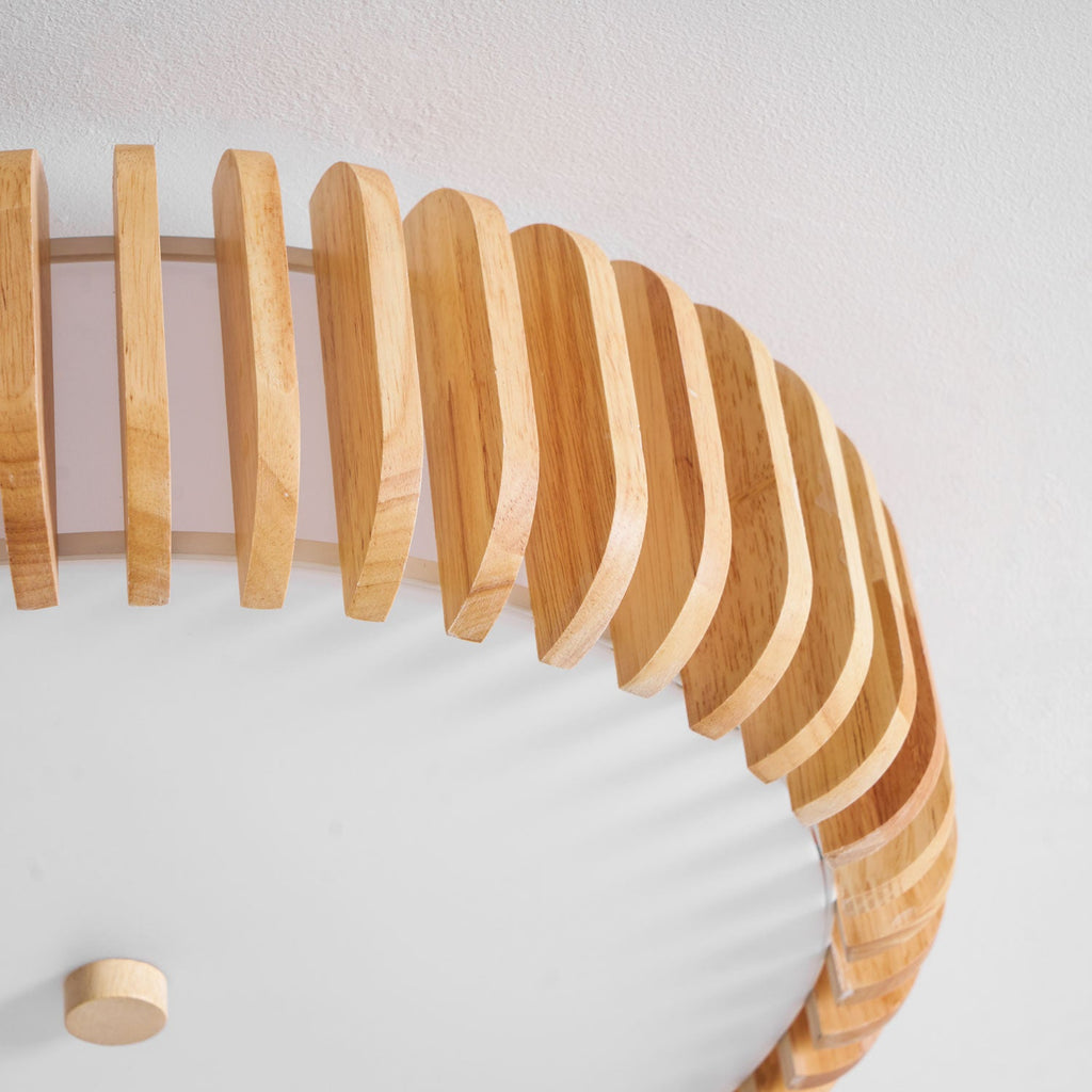 Close view of the slats and small ceiling canopy on this Clérachic ceiling light.