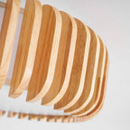 Close view of the wood slats on this Clérachic ceiling light, curving outward from below.