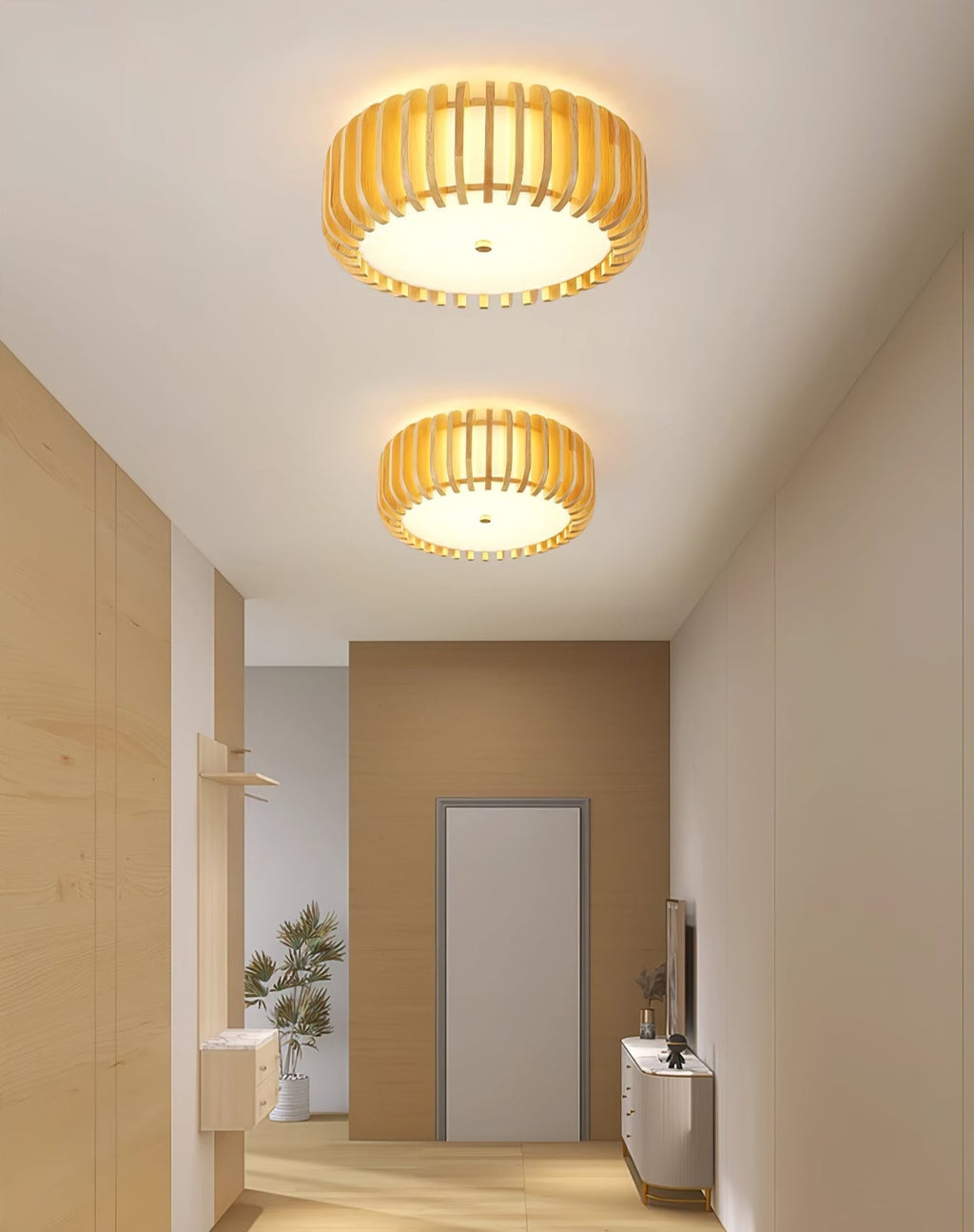 Two of this Clérachic ceiling light run lit along a hallway ceiling, leading to a wood door.