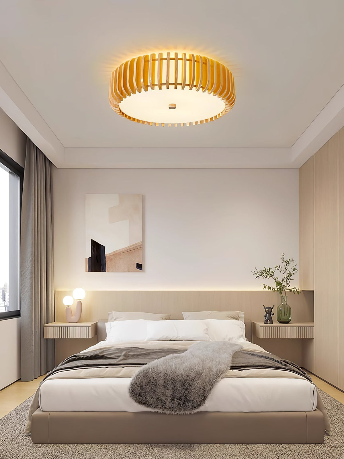 Framed artwork and matching nightstands flank the bed below this Clérachic ceiling light, lit.