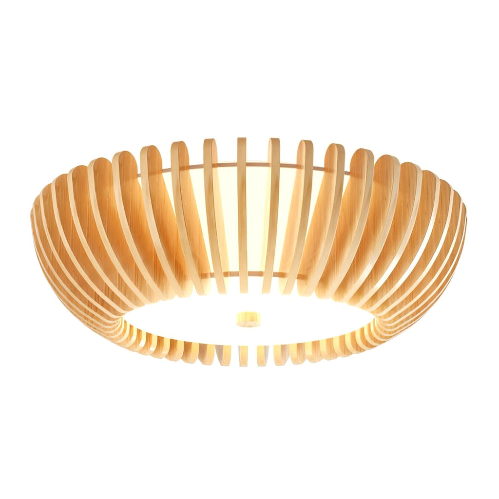 Straight-on underside view of this Clérachic ceiling light lit, glow spreading evenly through the slats.