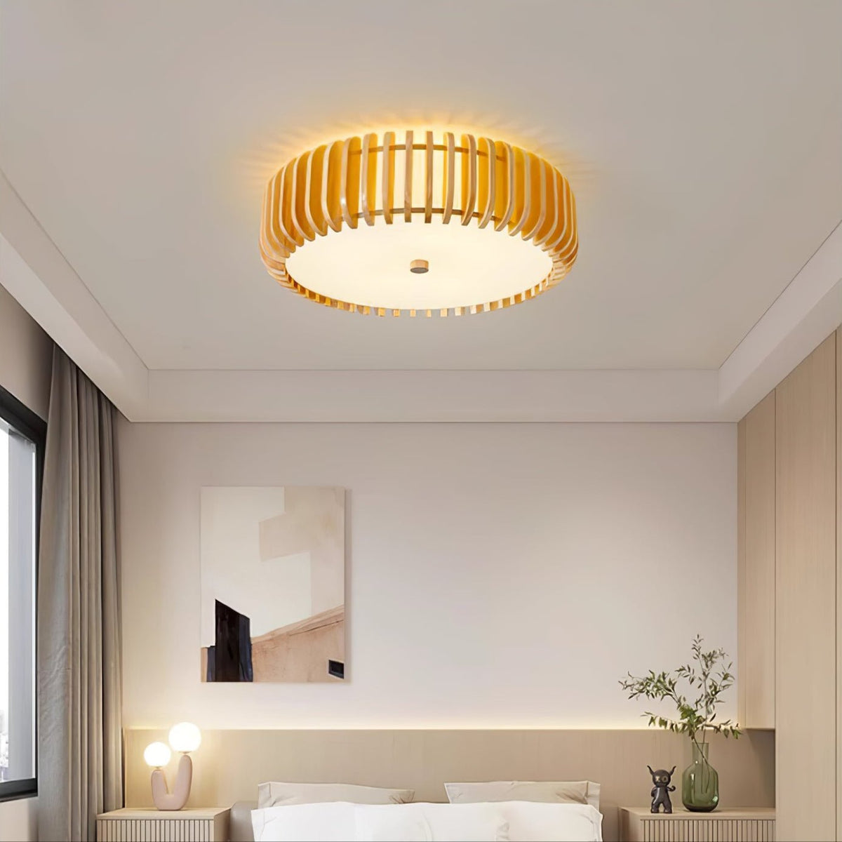 This Clérachic ceiling light lit above a bed, a framed print hanging on the wall nearby.