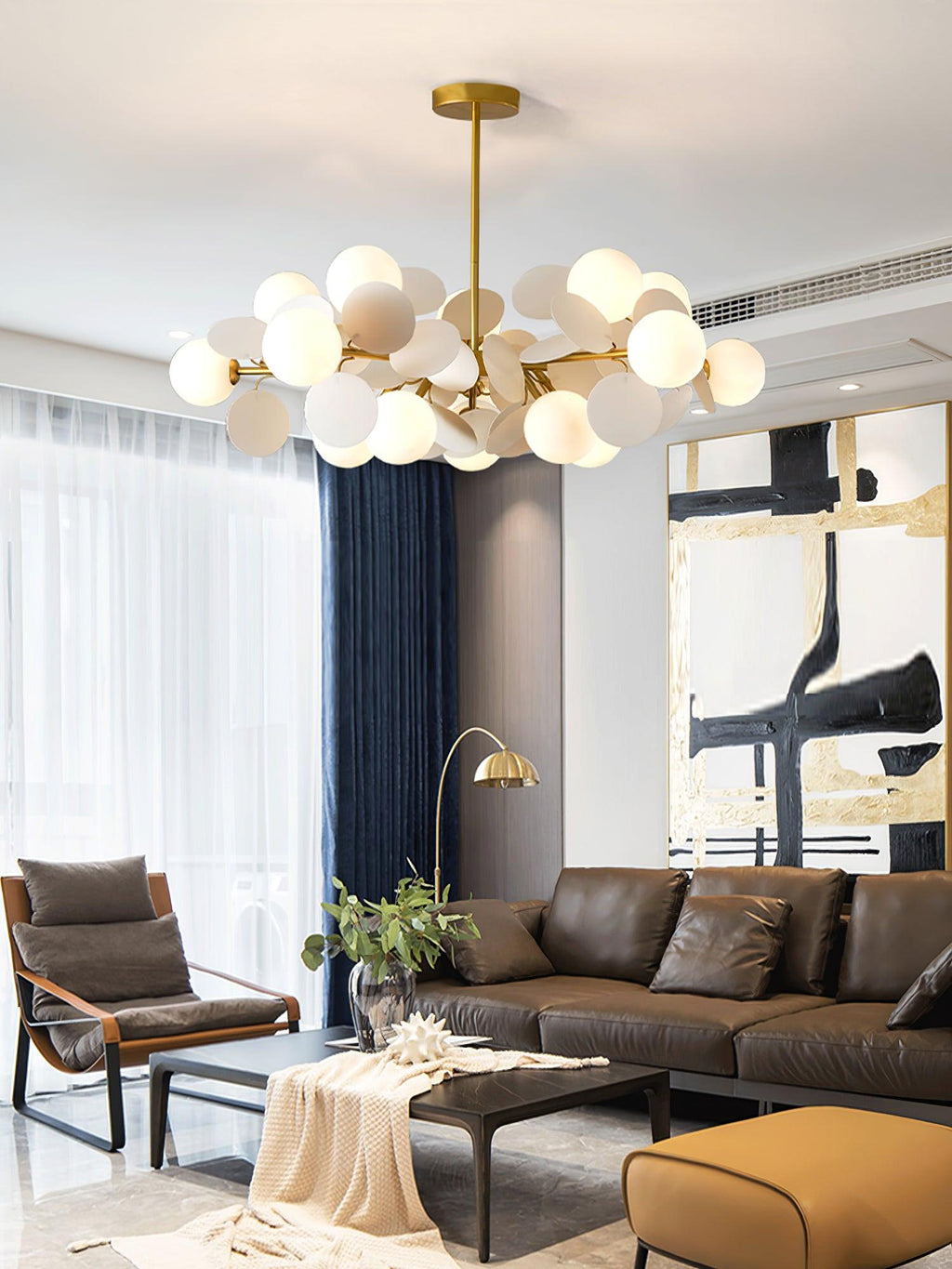 Tree chandelier hanging in a styled bedroom corner