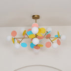 Tree chandelier glowing warmly above a seating arrangement