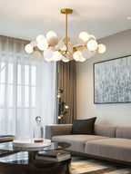 Tree chandelier detail of an individual lit glass shade