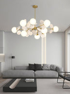 Tree chandelier shade and arm assembly shown in detail