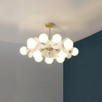 Tree chandelier hanging at full drop in a tall room