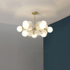 Close detail of the tree chandelier's gold branch tips