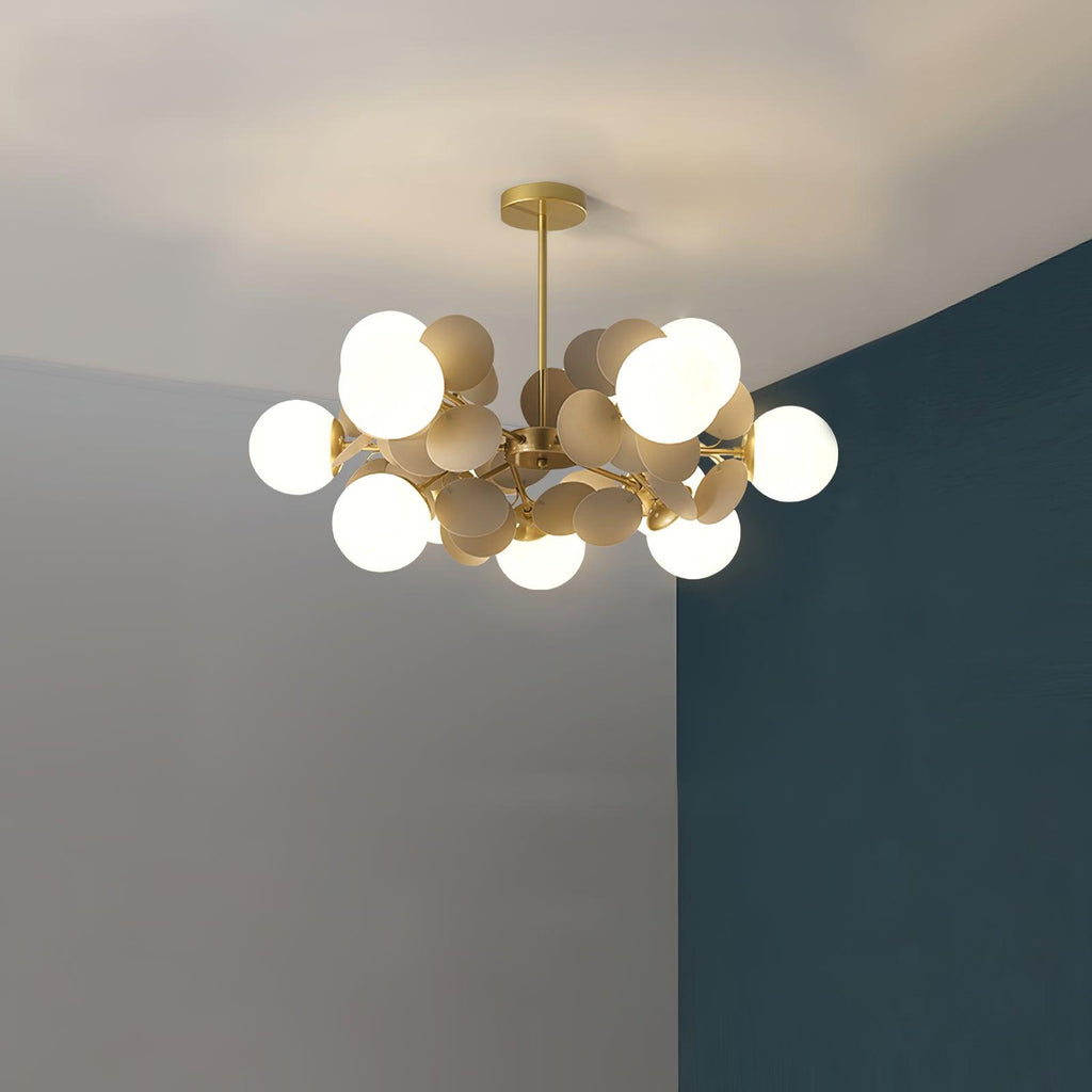 Tree chandelier styled in a warm contemporary lounge