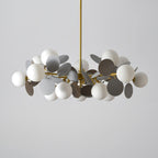 Tree chandelier close-up of the gold finish and glass shade rim