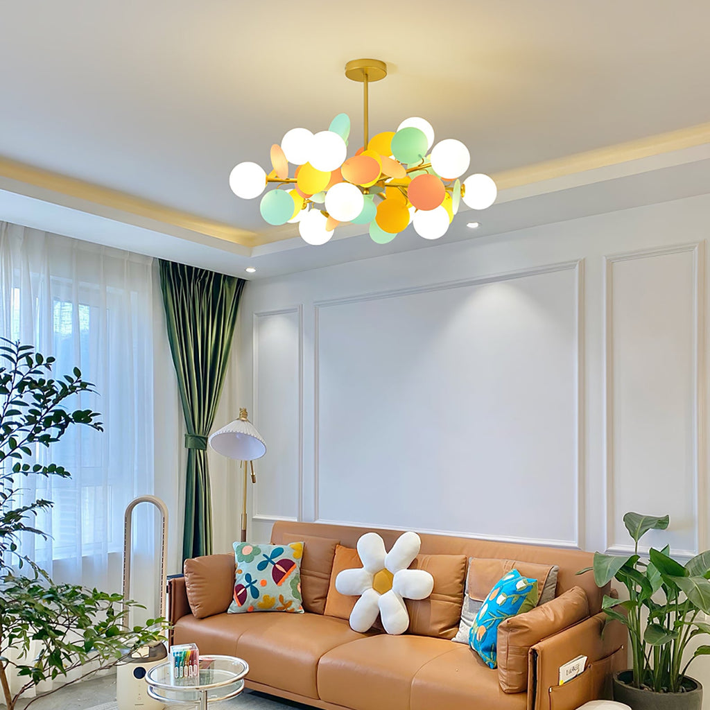 Tree chandelier with multiple heads arranged in a balanced botanical spread