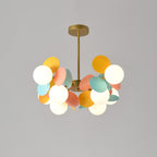 Close view of the open glass shades and gold branch arms of the tree chandelier