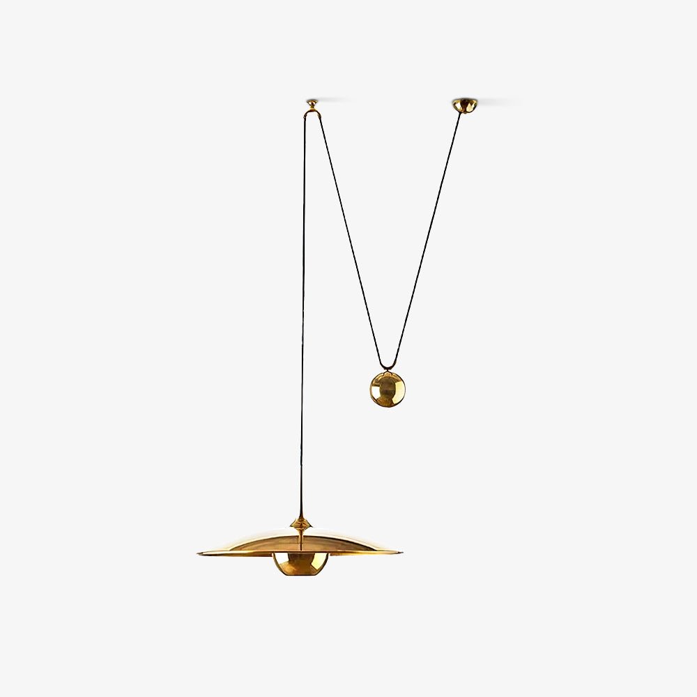 Metal globe pendant light hanging from an adjustable cable