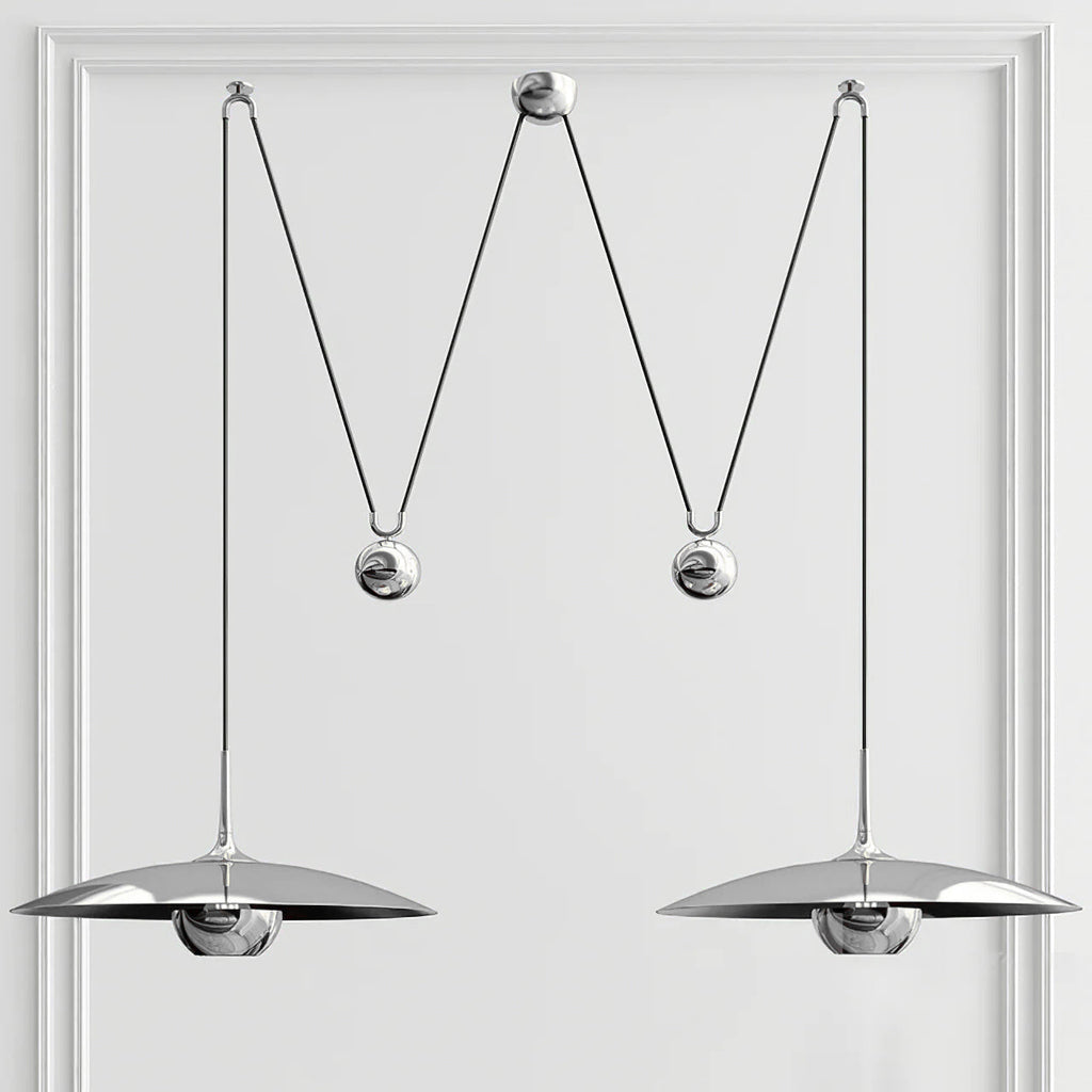Round pendant light with polished metal finish close up